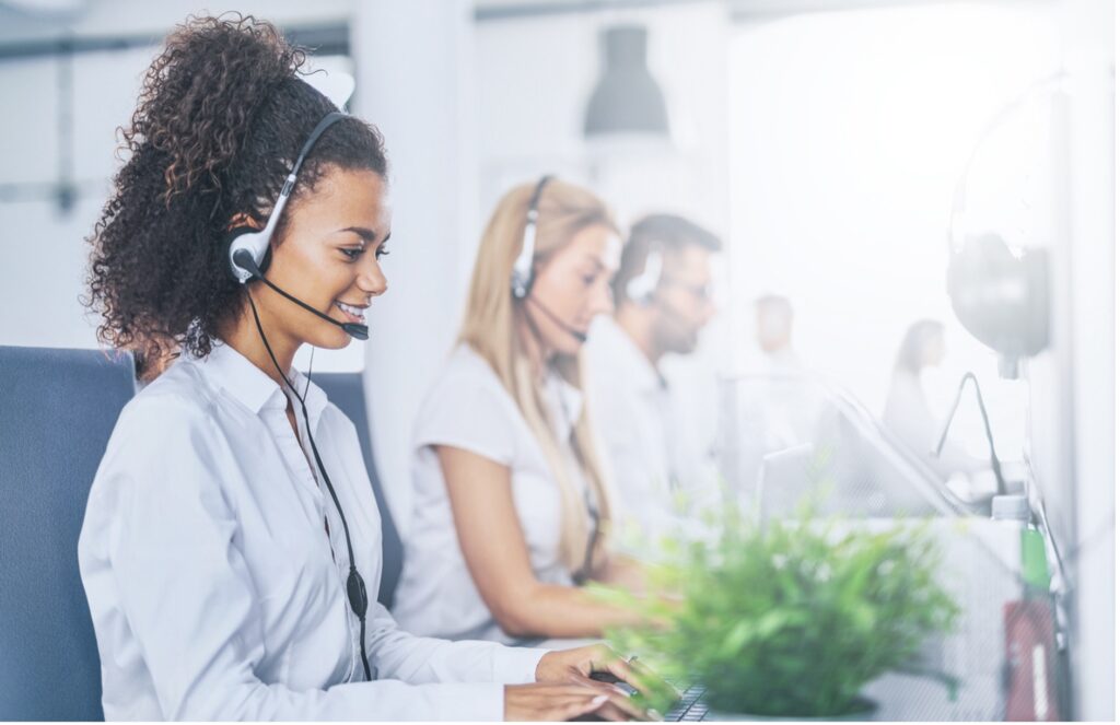 A person wearing headset and using a computer, Employee Presence: The Foundation of Company Culture